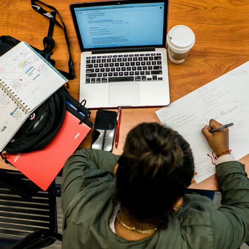 student on laptop studying