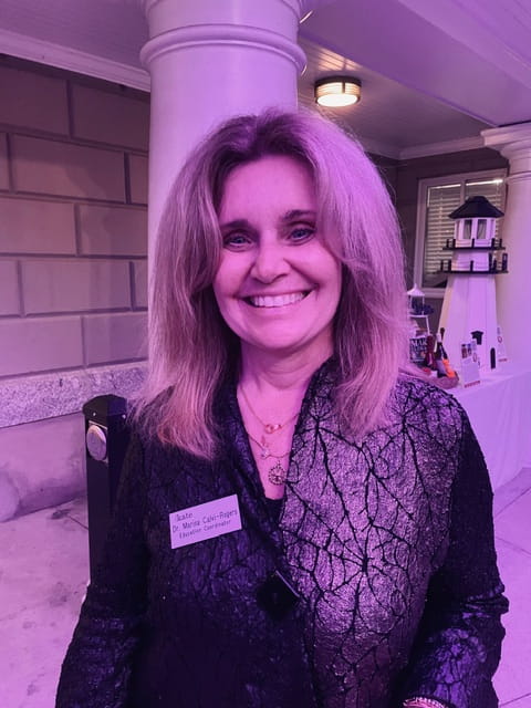 Dr. Marisa Calvi-Rogers