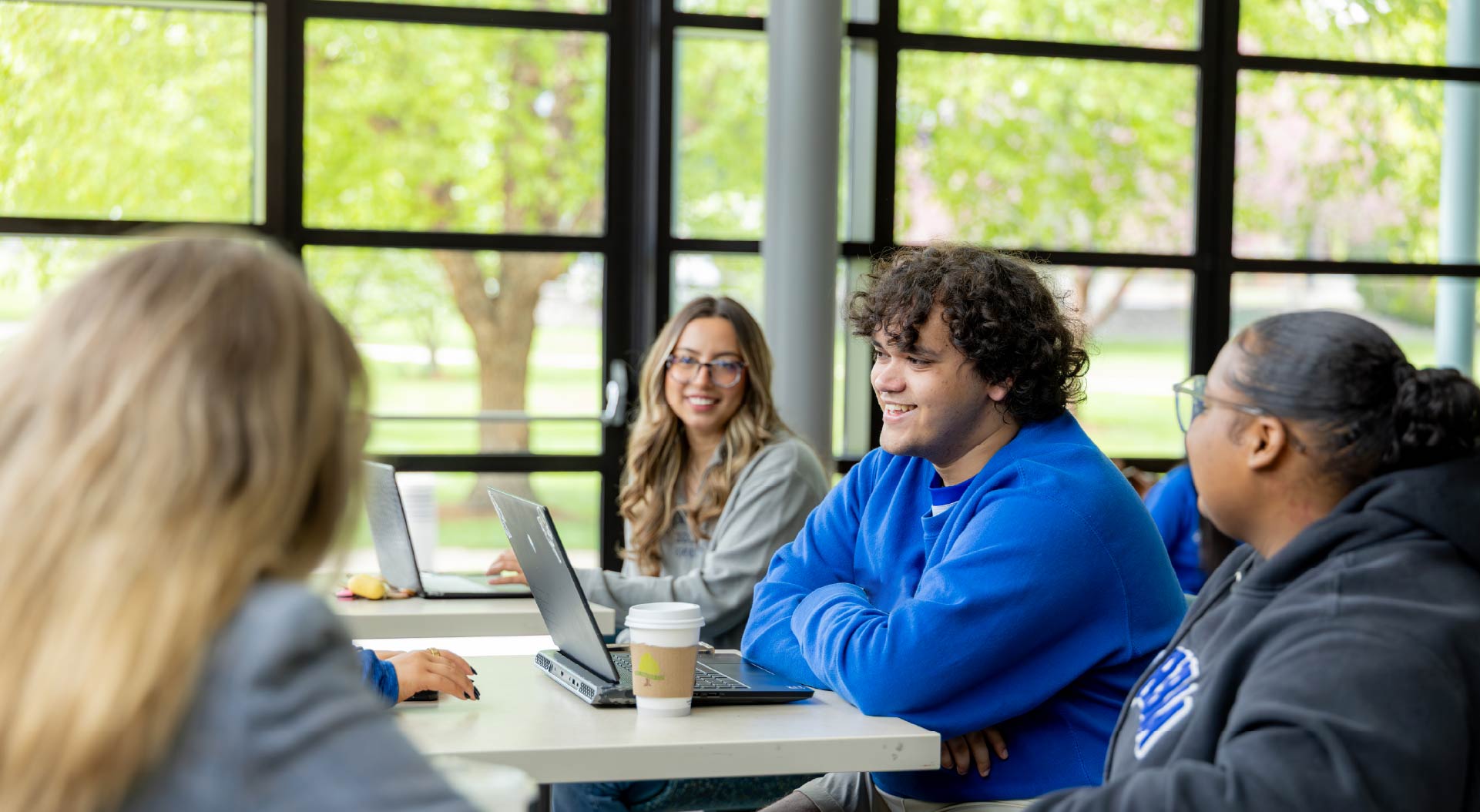 Students working at the cafe